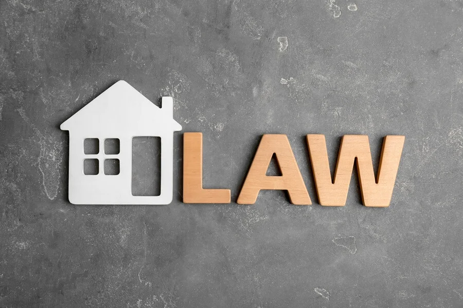 A home law concept on a gray background.